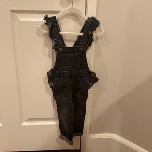 Toddler girls’ art class denim overalls.